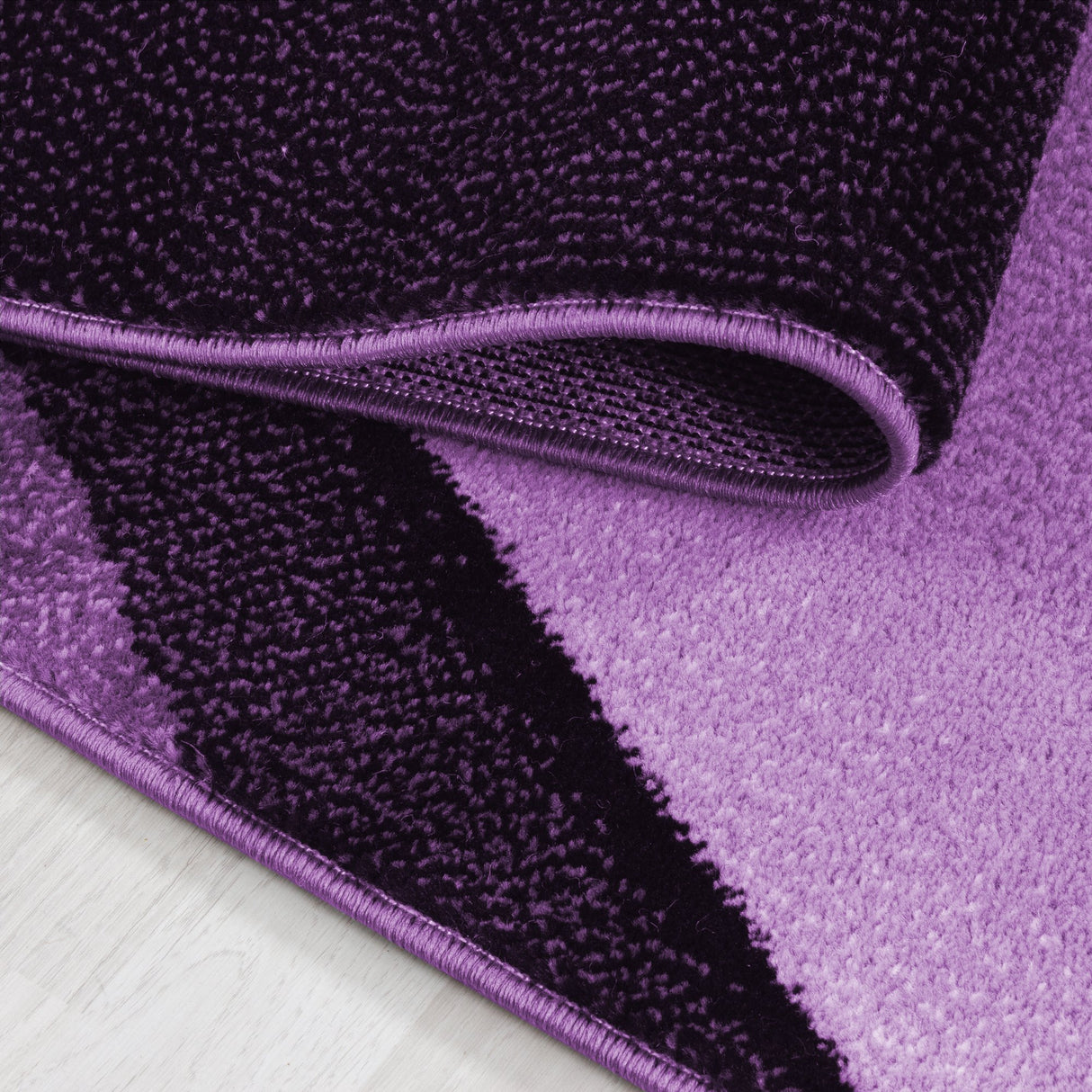 Nour 8010 Violett – Moderner Uni Teppich mit zeitlosem Design