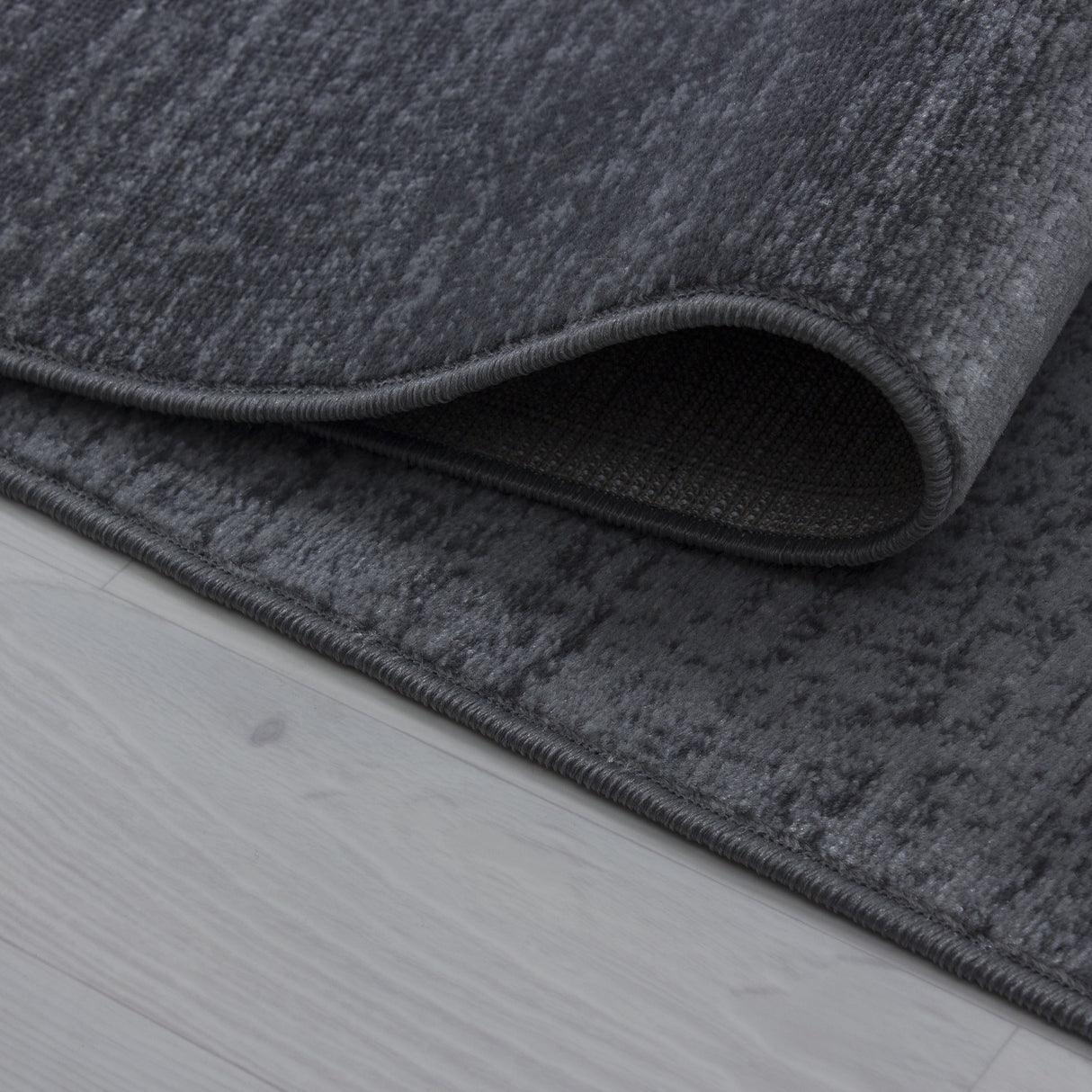Nour 8002 Grau – Moderner Uni Teppich mit zeitlosem Design