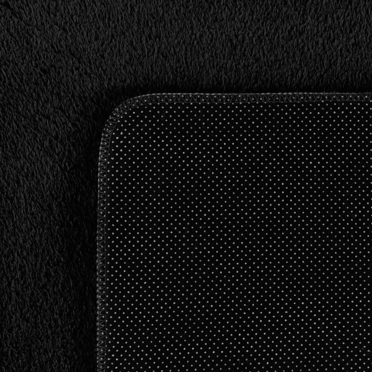 Nora 1400 Schwarz –  Moderner Uni Teppich mit rutschfester Filz-Rückseite