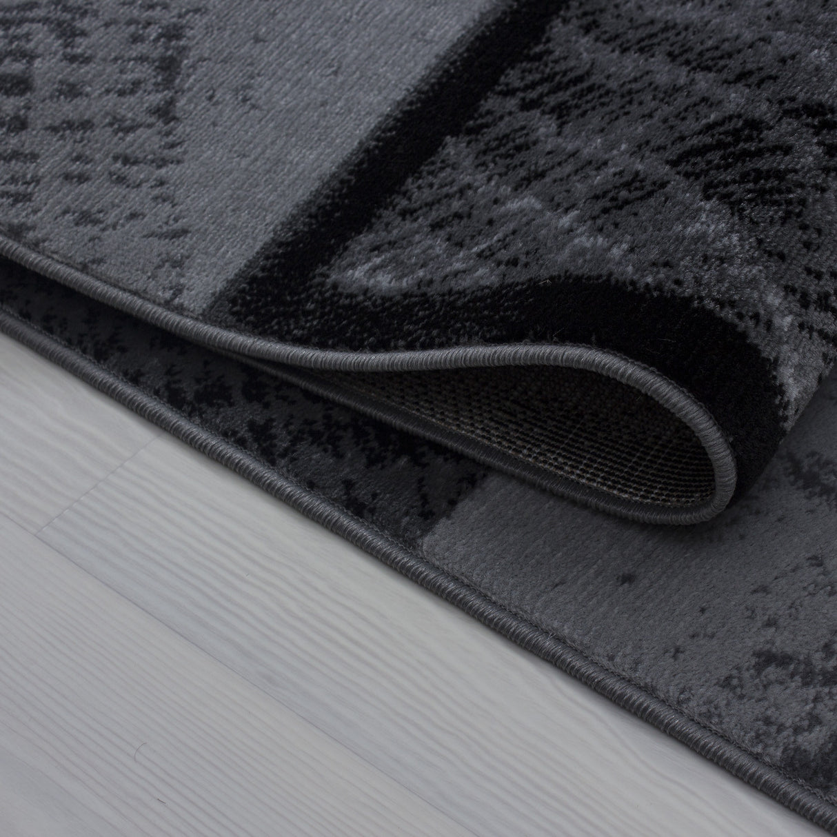 Nour 8003 Schwarz – Moderner Uni Teppich mit zeitlosem Design