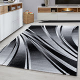 Kristal 9210 Black – Modern solid-color rug with a timeless design