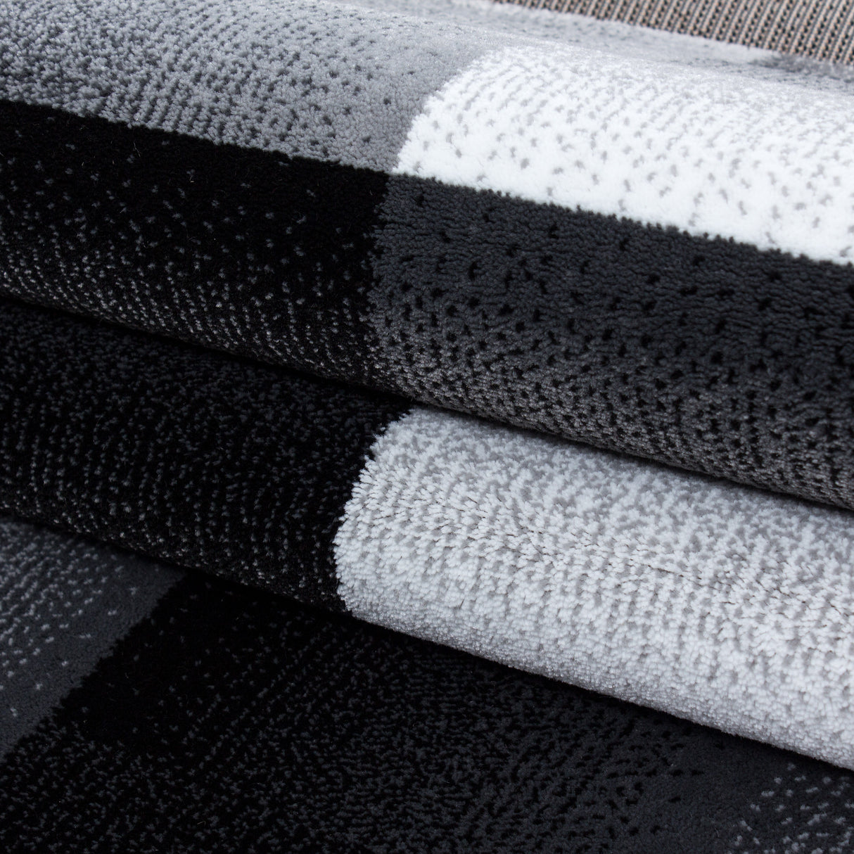 Carisma 6560 Schwarz – Moderner Uni Teppich mit zeitlosem Design