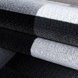 Carisma 6560 Schwarz – Moderner Uni Teppich mit zeitlosem Design